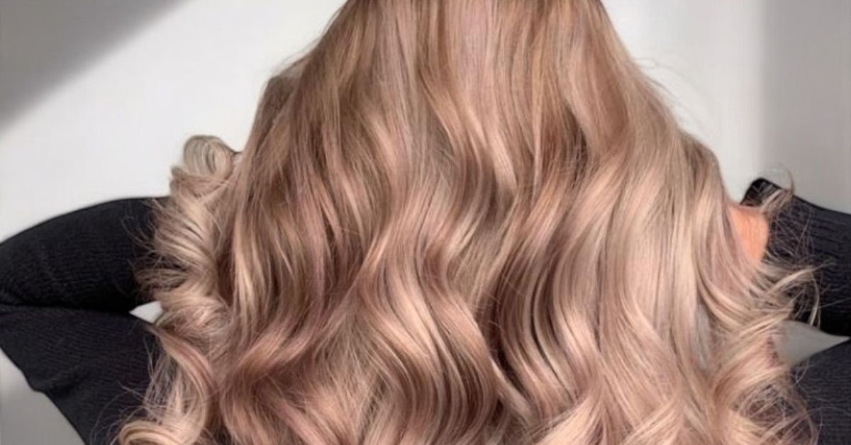 beautiful lady with beautiful hair color by Salon de Allure in Ennis Texas