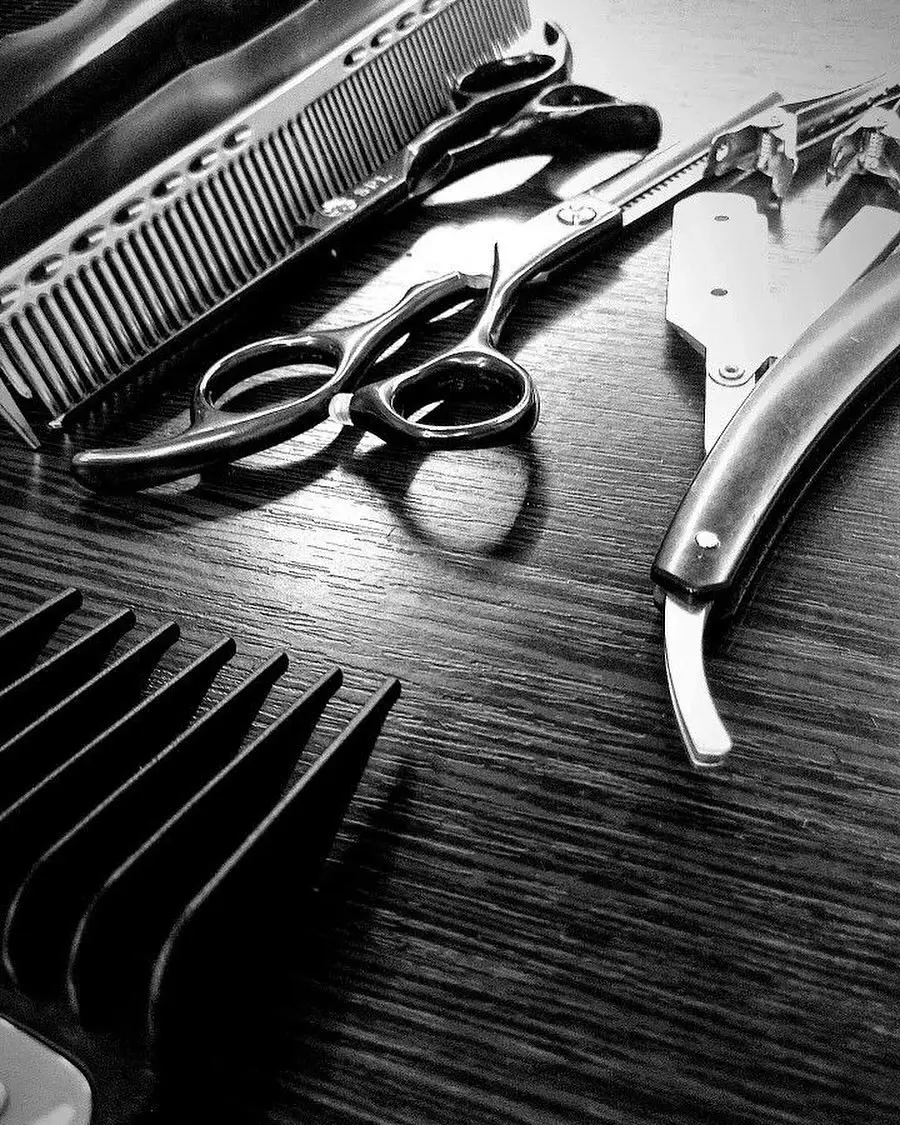 Professional hair styling and cutting tools at Salon De Allure