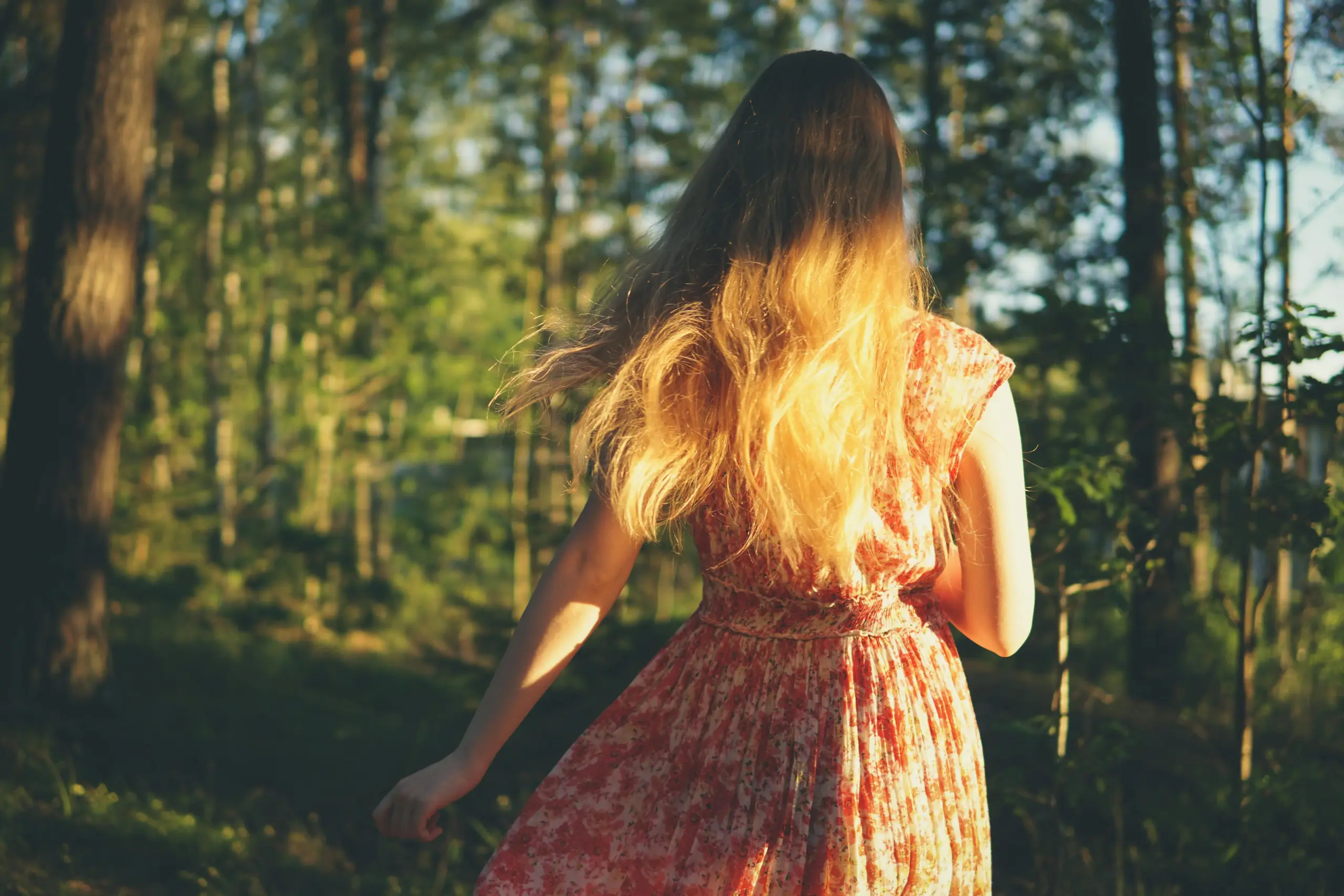 Sun-kissed summer hair in natural light showing healthy, hydrated hair protected from heat and humidity in Ennis TX