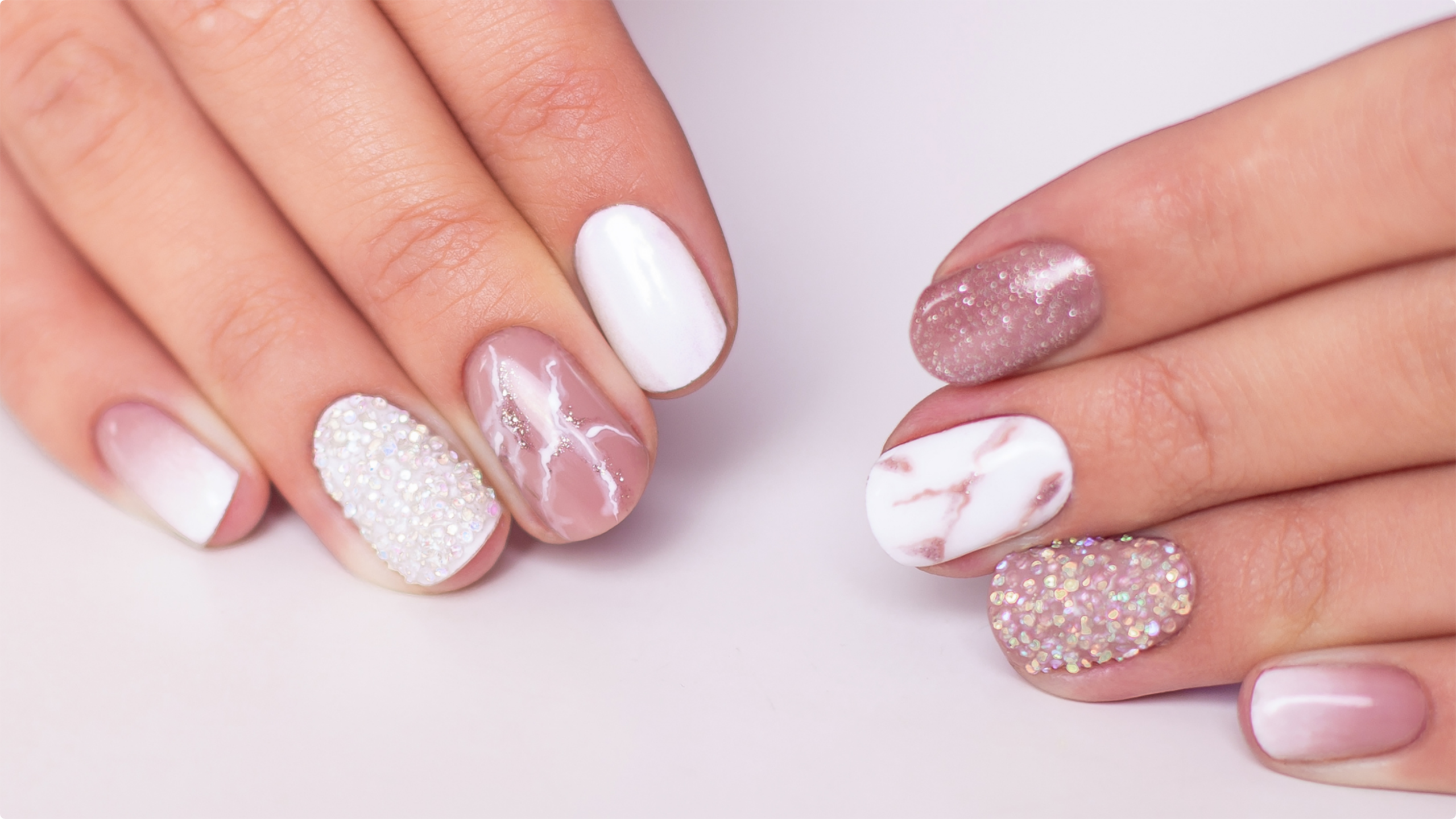 Soft pink, white, and glitter fall manicure at a nail salon in Ennis, TX